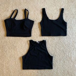 Three black crop tops